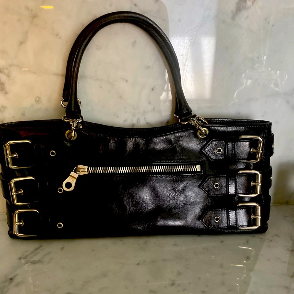 Edgy black bag with silver hardware.